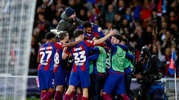 Barcelona's players pictured celebrating during their 3-1 win over Napoli in March 2024